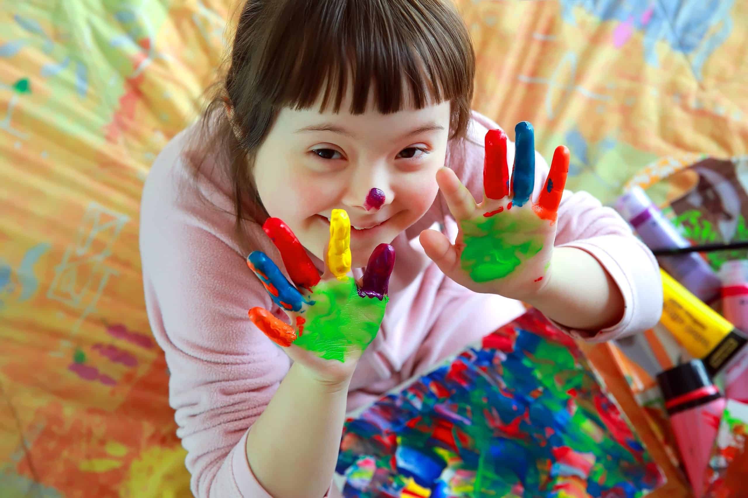 coloured-hands-girl-with-disability